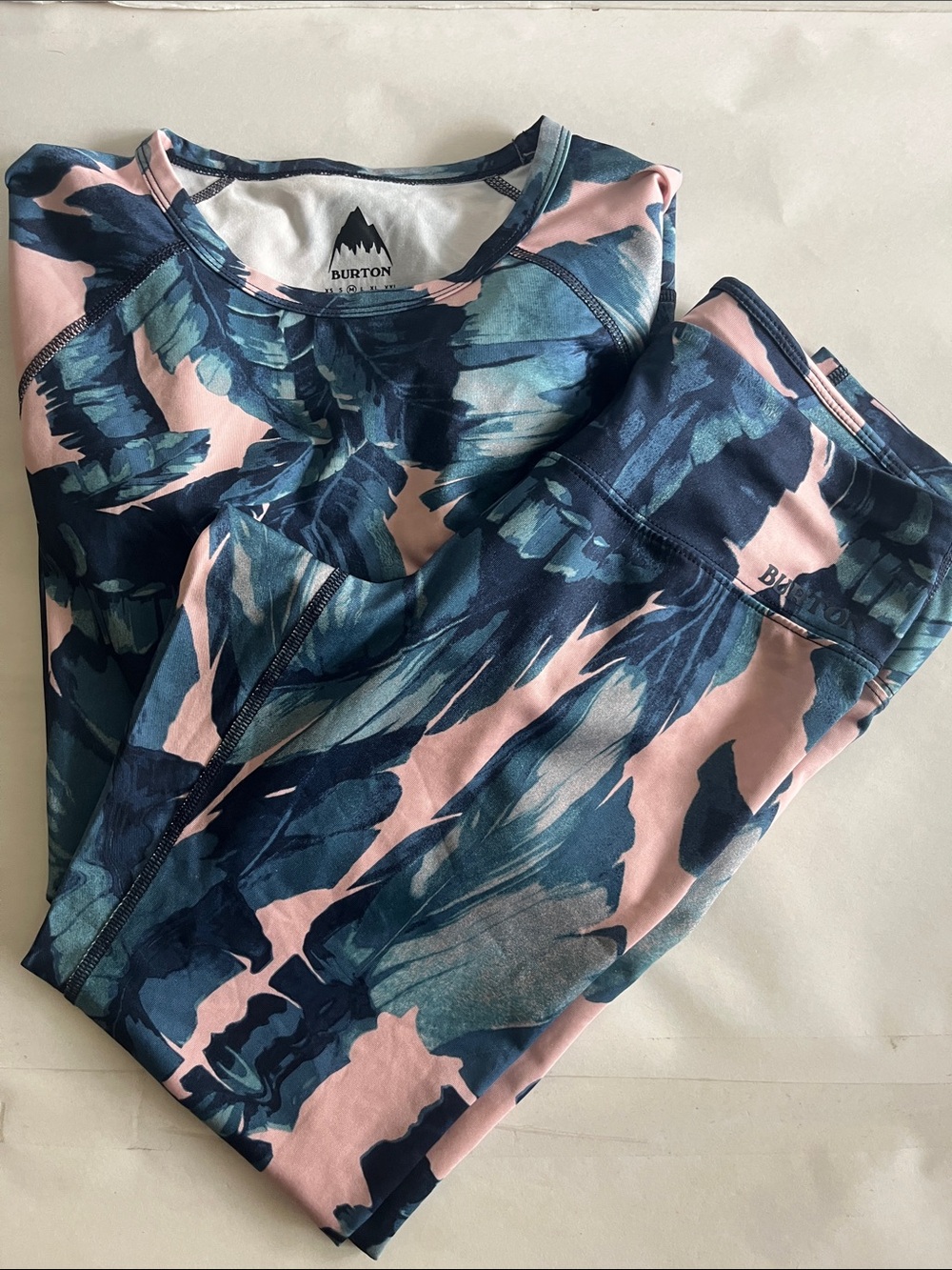 Burton women's long-sleeve pants set base layer with a blue & pink tropical leaf